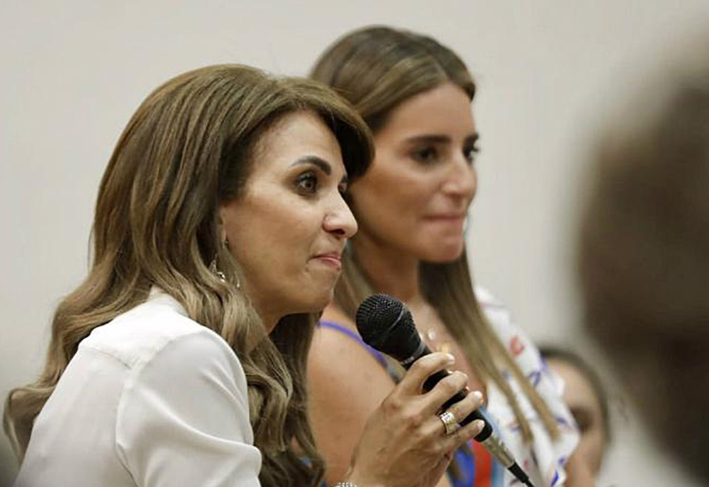 Two ladies at panel session